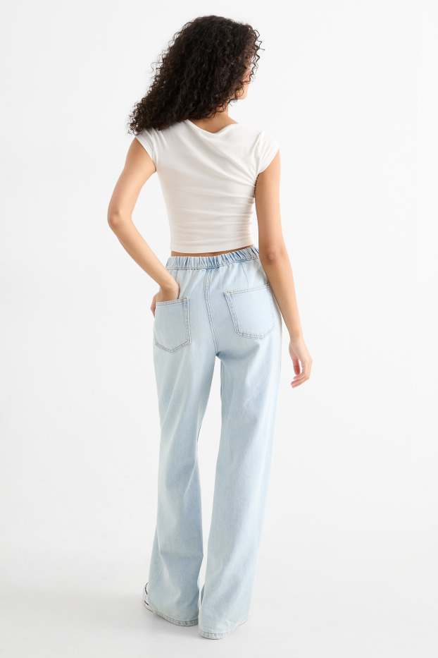 Dona - Wide leg jeans - mid waist - texà blau clar