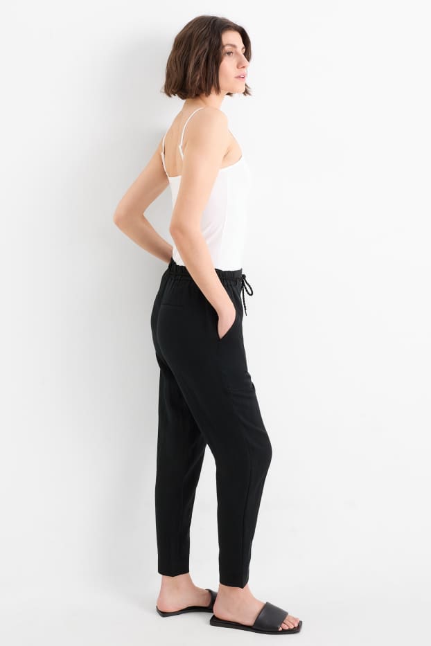 Femmes - Pantalon de toile - high waist - tapered fit - noir