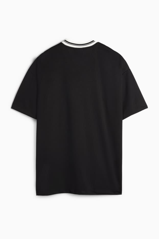 Femmes - T-shirt à col V - oversize - Les 101 Dalmatiens - noir