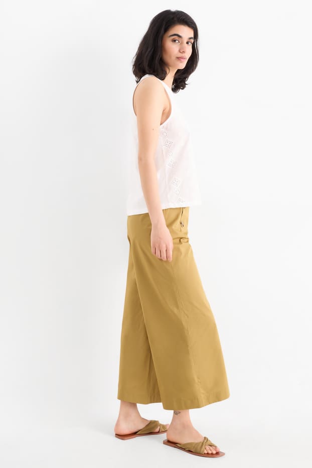 Dona - Pantalons de tela - high waist - wide leg - groc mostassa