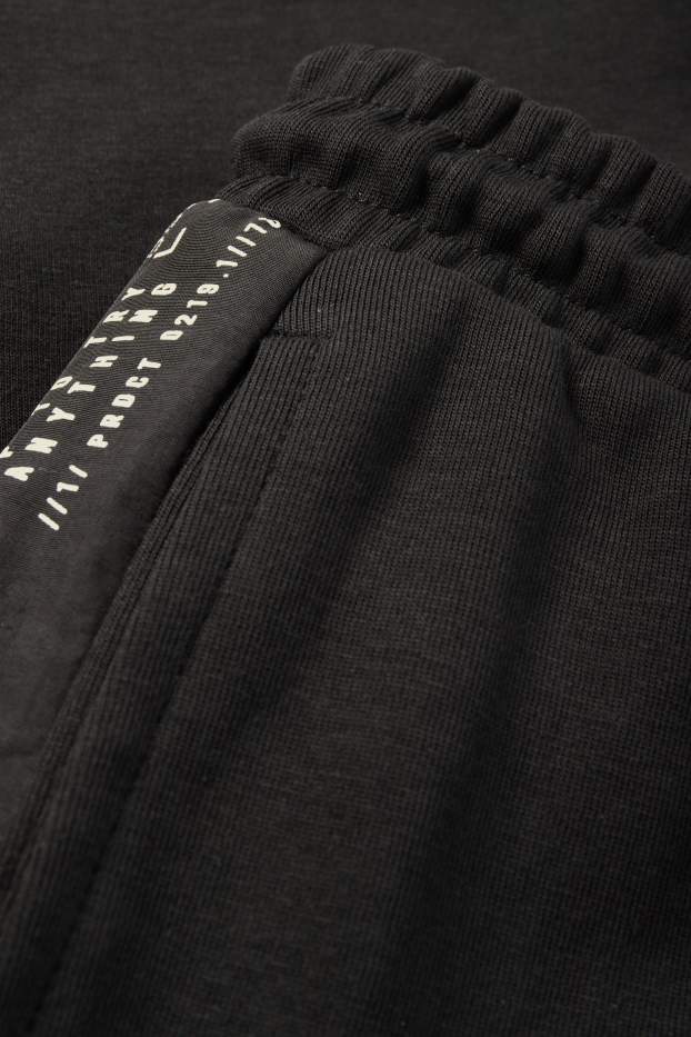 Kinderen: jongens - Sweatshort - zwart
