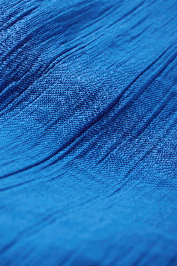 Dona - Top de brusa amb nus - texturada - blau