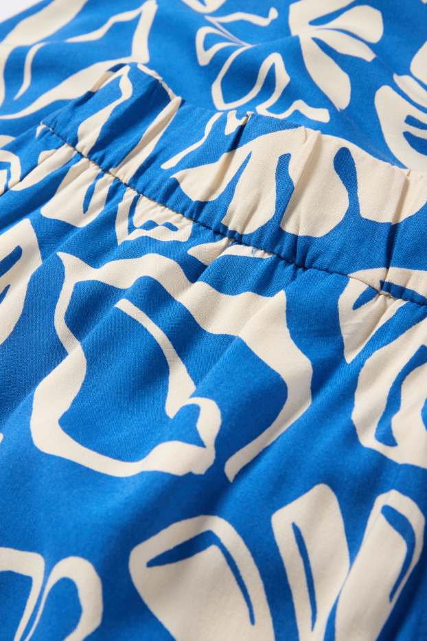 Dona - Pantalons de tela - high waist - wide leg - estampat - blau/blanc