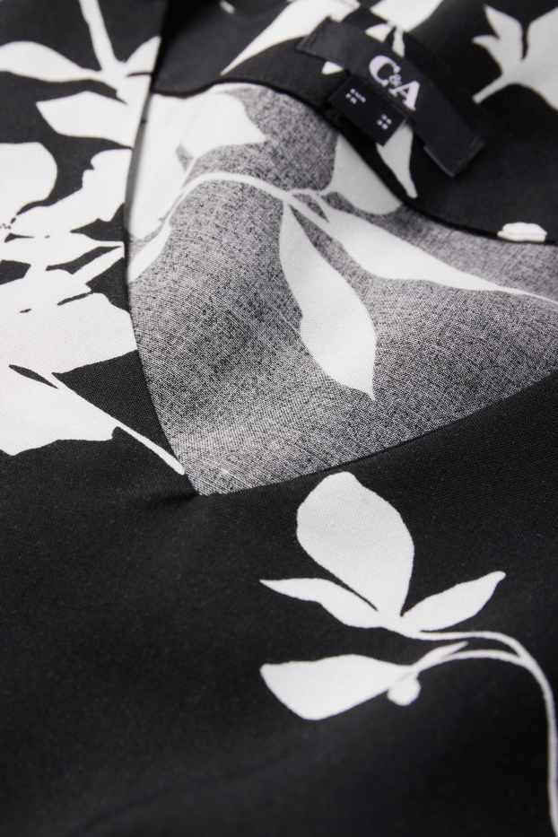 Dames - Blouse met V-hals - gebloemd - zwart / wit