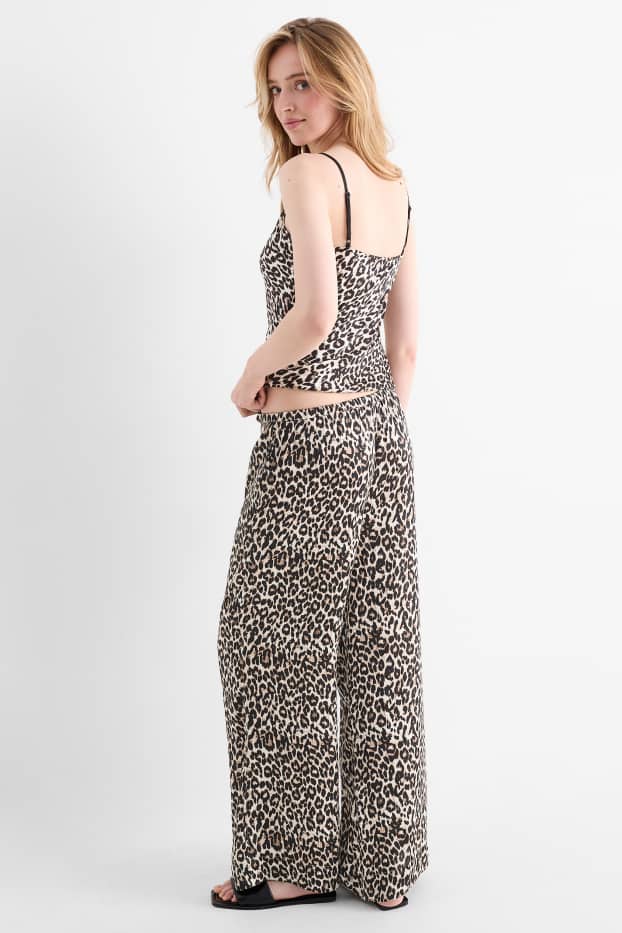 Femmes - Pantalon en toile - high waist - jambes larges - imprimé léopard - noir / beige