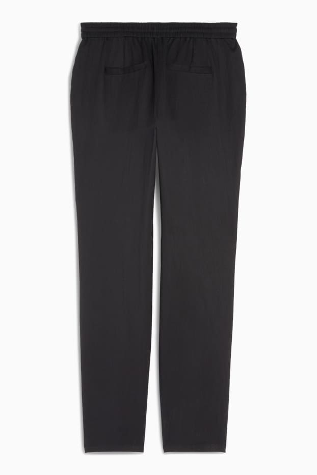 Kobiety - Spodnie materiałowe - średni stan - tapered fit - czarny