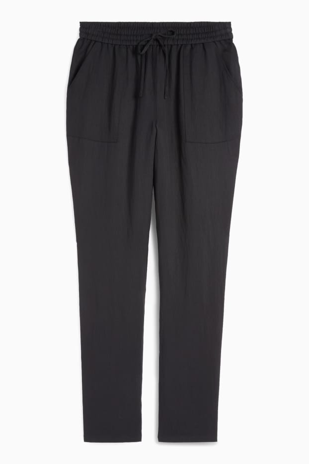 Kobiety - Spodnie materiałowe - średni stan - tapered fit - czarny