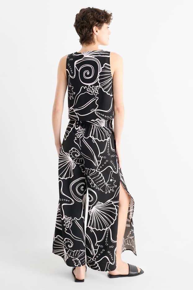 Femei - Pantaloni de stofă - talie medie - loose fit - cu model - negru / alb