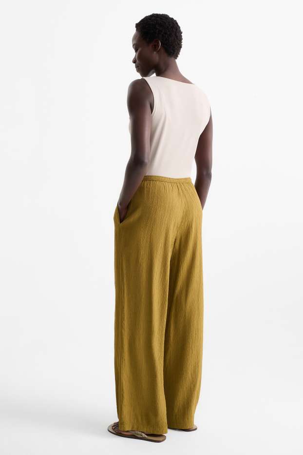 Femmes - Pantalon de toile - mid waist - wide leg - jaune moutarde
