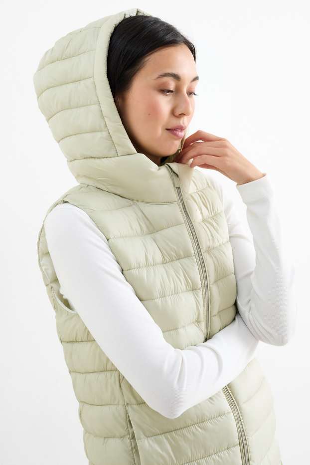 Dames - Lange bodywarmer met capuchon - licht beige