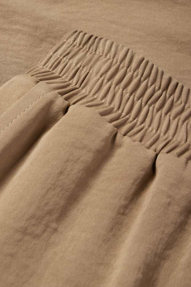 Women - Cloth trousers - high waist - wide leg - light brown