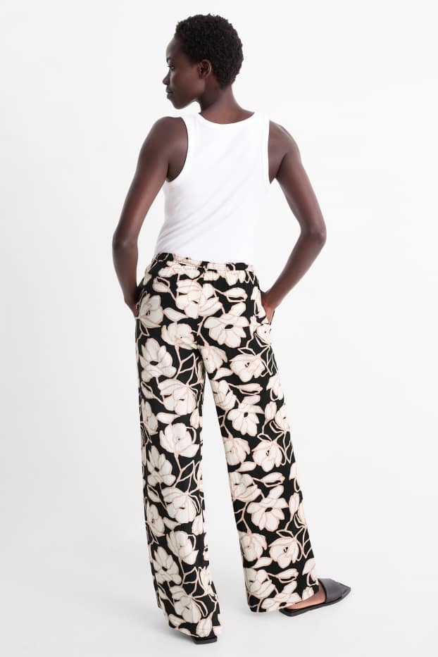 Femmes - Pantalon en toile - mid waist - palazzo - à fleurs - noir / beige