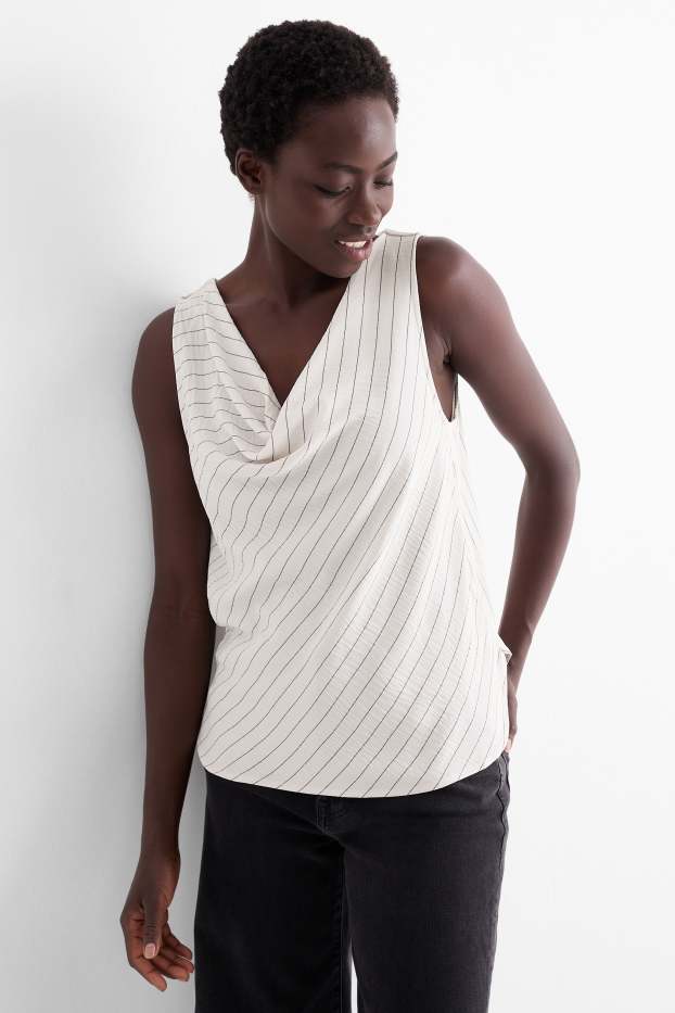 Dona - Brusa sense mànigues - de ratlles - negre/blanc