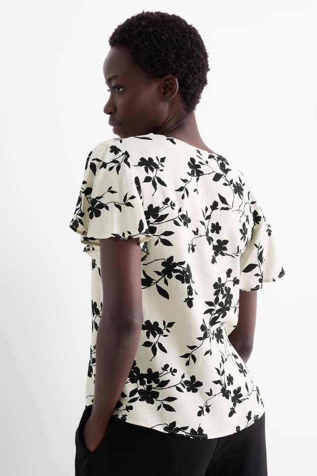 Dames - Blouse met volants - gebloemd - zwart / beige