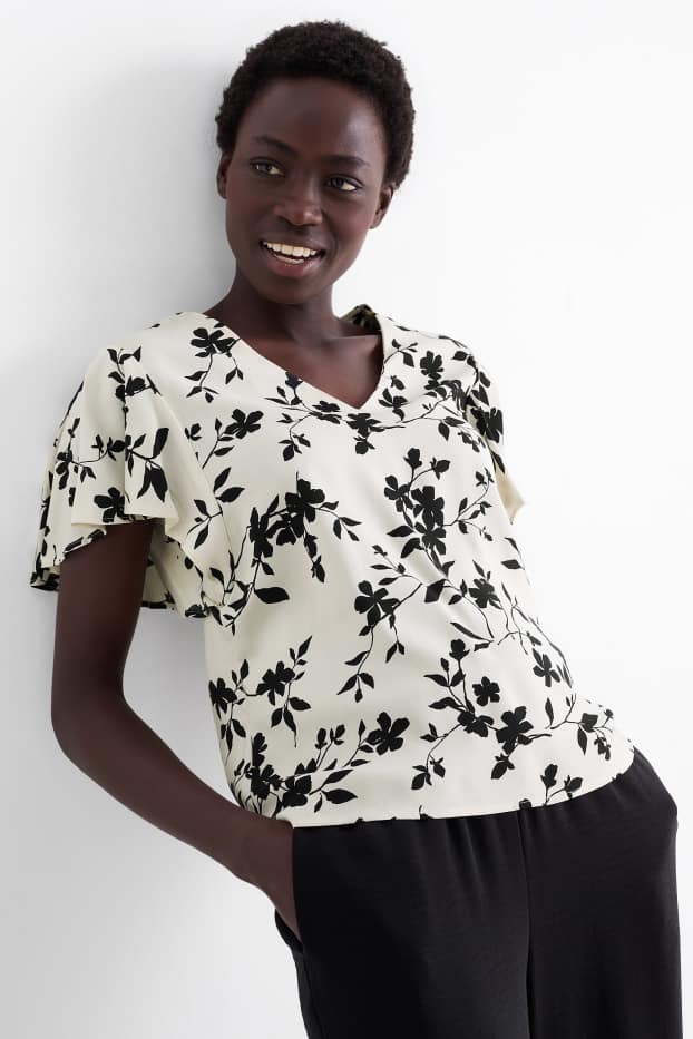 Dames - Blouse met volants - gebloemd - zwart / beige