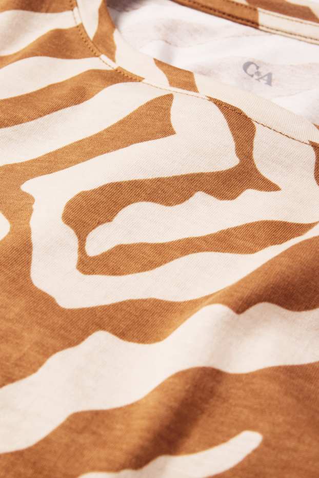 Dames - T-shirt - regular fit - met patroon - oranje / beige