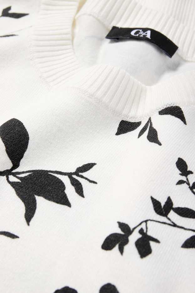 Femmes - Pull en maille - manches courtes - à fleurs - blanc / noir
