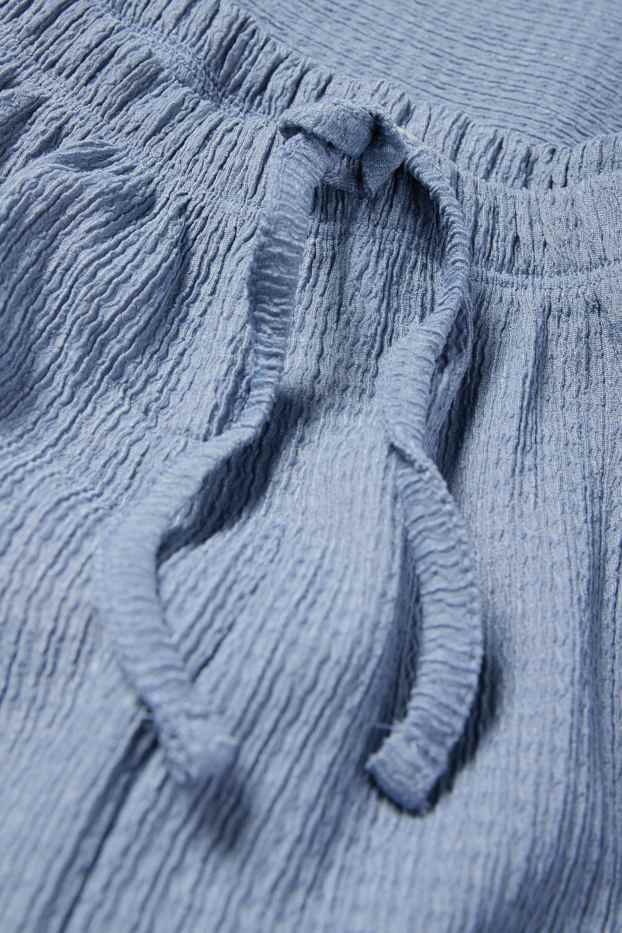 Dámské - Žerzejové kalhoty - mid waist - wide leg - strukturované - modrá