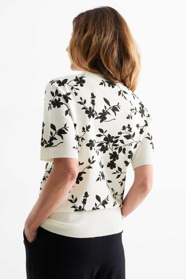 Femmes - Pull en maille - manches courtes - à fleurs - blanc / noir