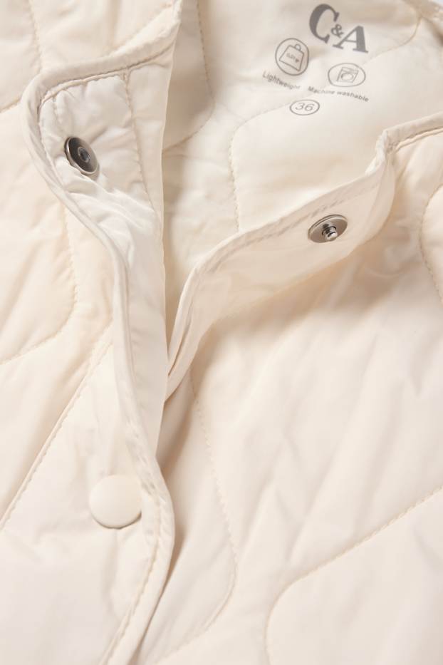Dona - Armilla embuatada - blanc trencat