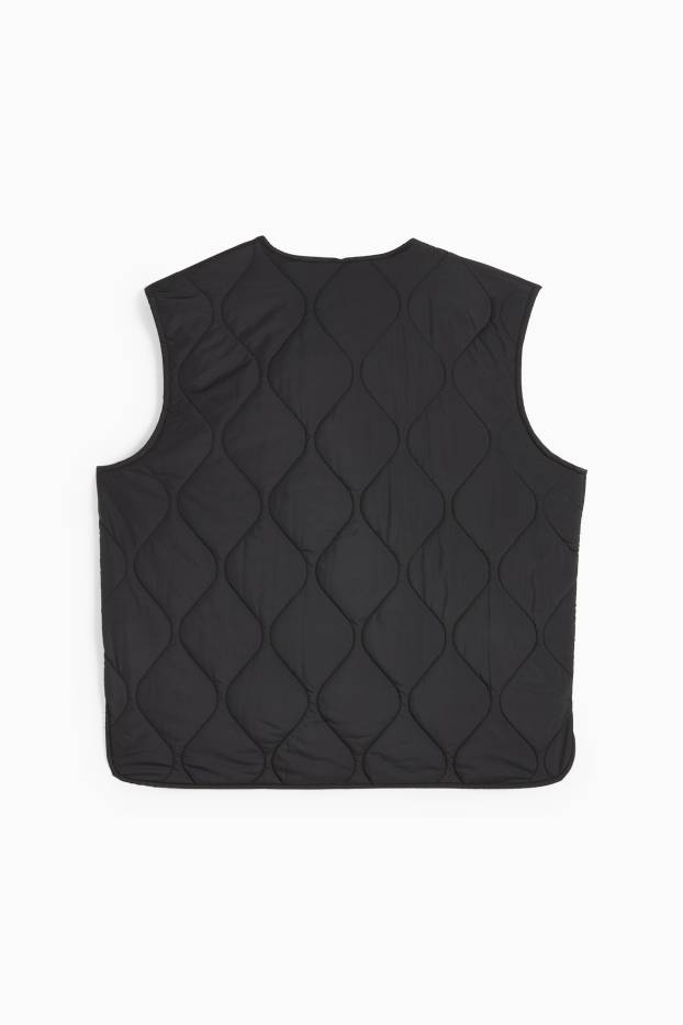 Dona - Armilla embuatada - negre