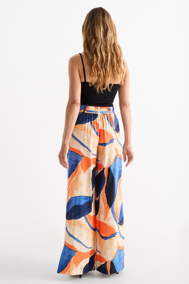 Dames - Pantalon - high waist - wide leg - met patroon - oranje / blauw