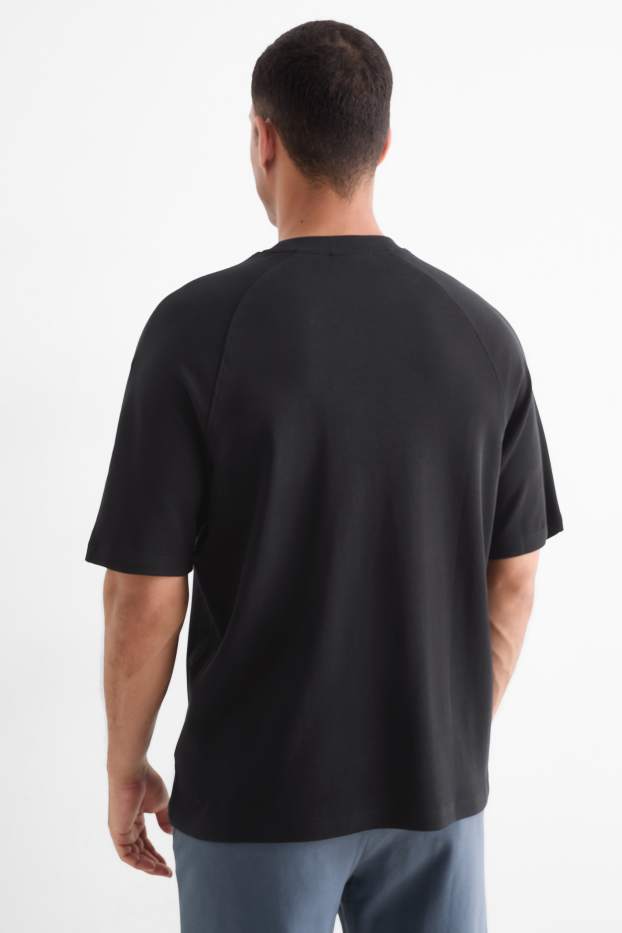 Herren - T-Shirt - Relaxed Fit - schwarz