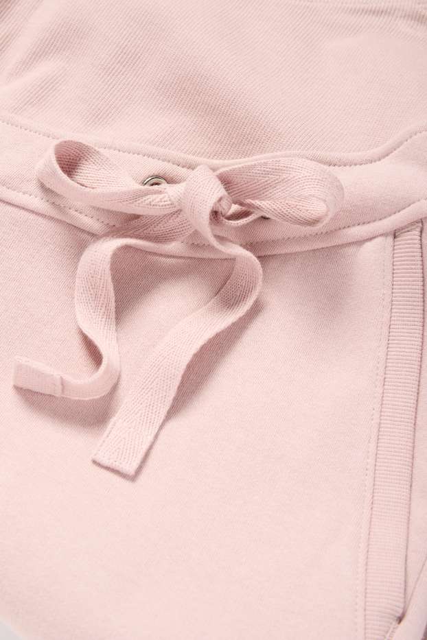 Damen - Umstands-Jogginghose - rosa