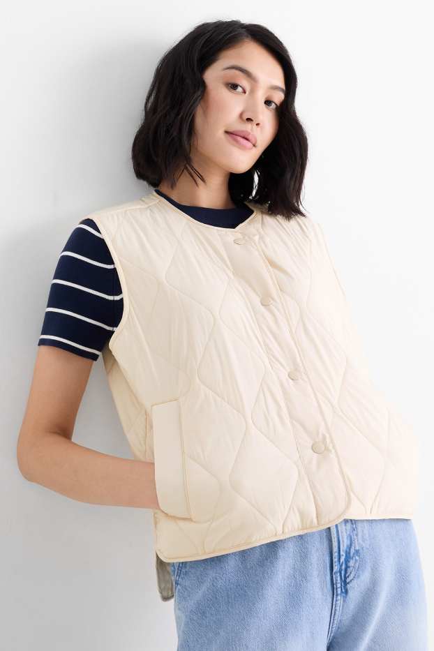 Dona - Armilla embuatada - blanc trencat