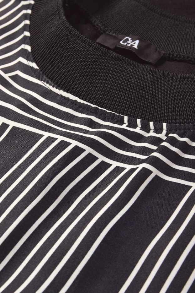 Femmes - T-shirt - relaxed fit - à motif - noir