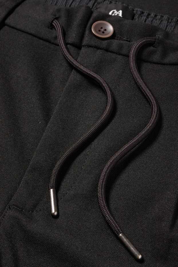 Pánské - Kalhoty chino - tapered fit - černá