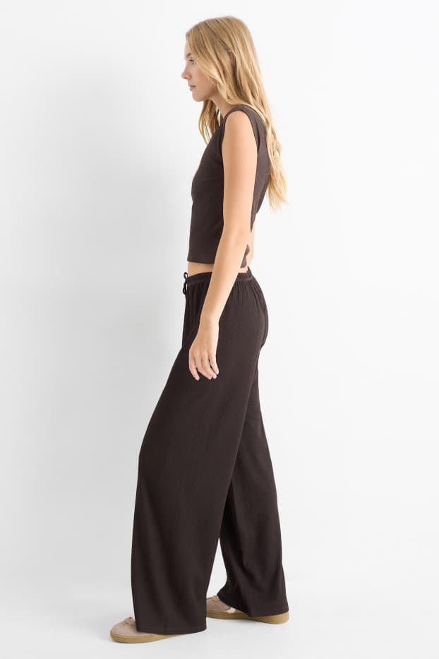 Dames - Broek van jersey - mid waist - wide leg - met structuur - donkerbruin