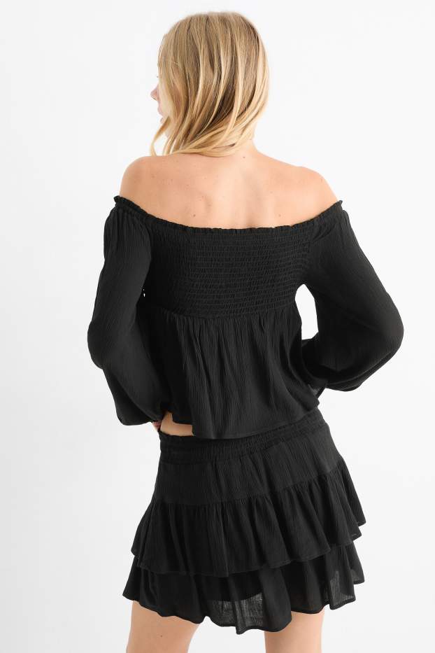 Dames - Korte blouse - gesmokt - zwart