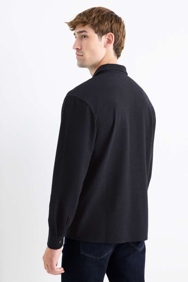 Hommes - Chemise en maille - loose fit - col à revers - finition côtelée - noir