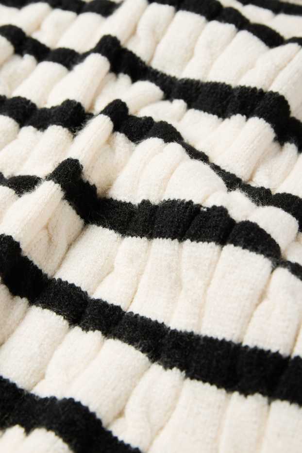 Kinder Mädchen - Pullover - gestreift - Zopfmuster - schwarz / weiß