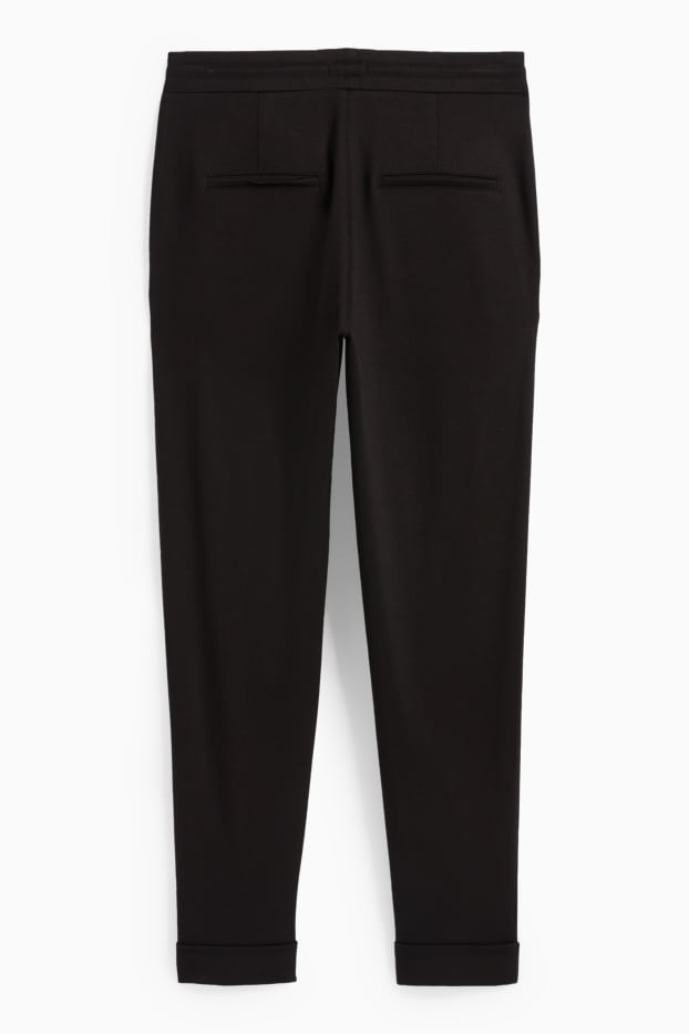 Dames - Broek van jersey - mid waist - tapered fit - zwart