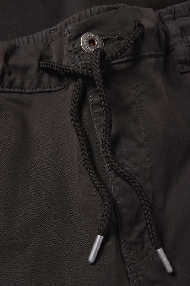 Uomo - Pantaloni cargo - tapered fit - nero