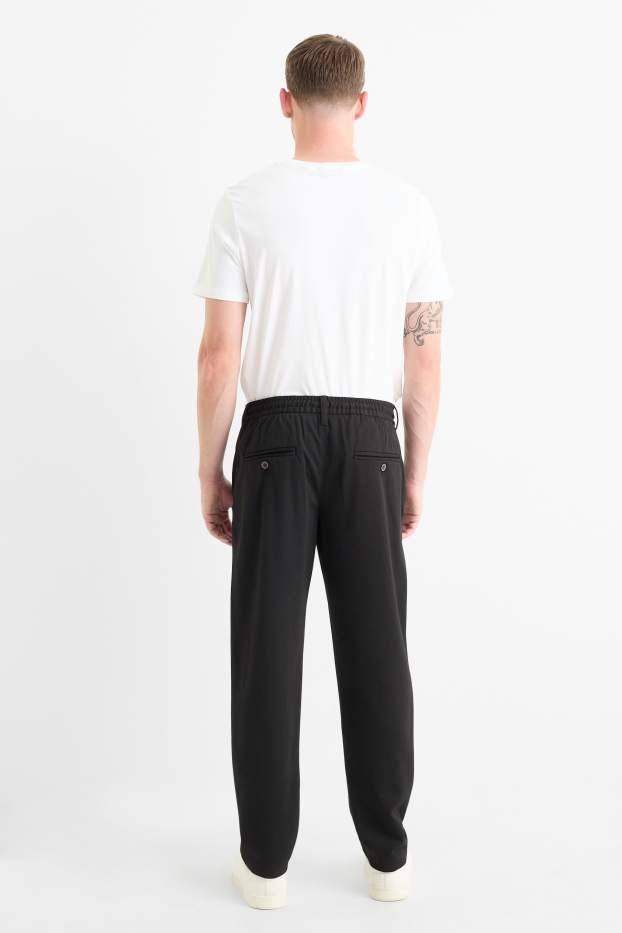 Pánské - Kalhoty chino - tapered fit - černá