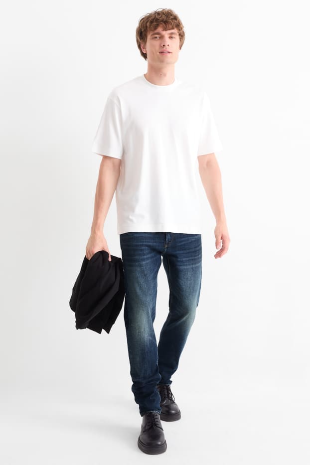 Home - Slim Tapered Jeans - LYCRA® - texà blau fosc