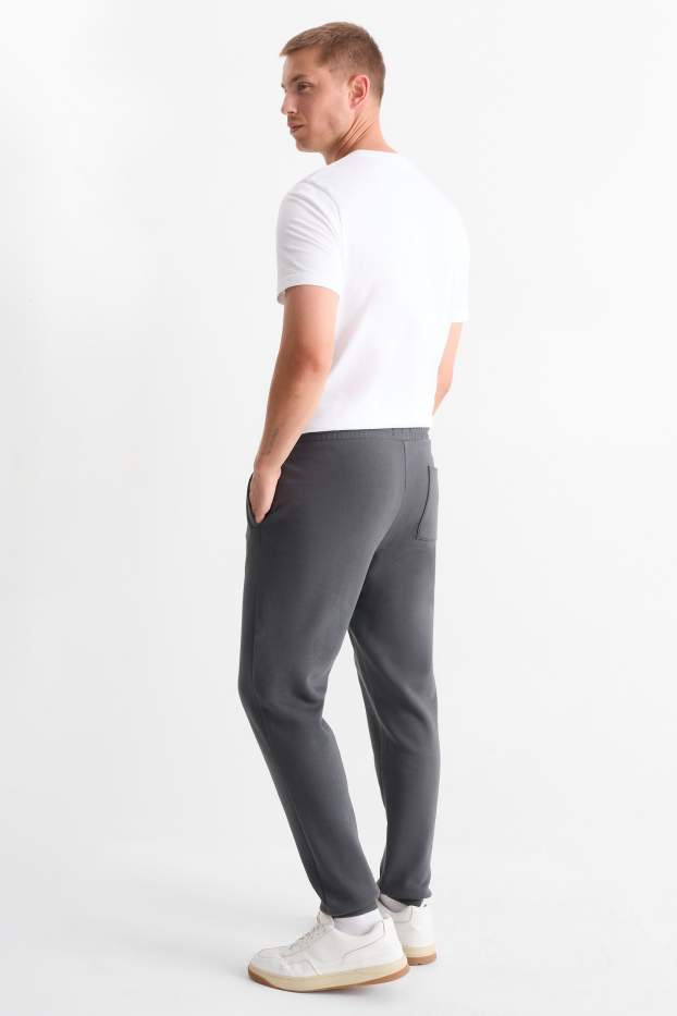 Hommes - Pantalon de jogging - gris foncé