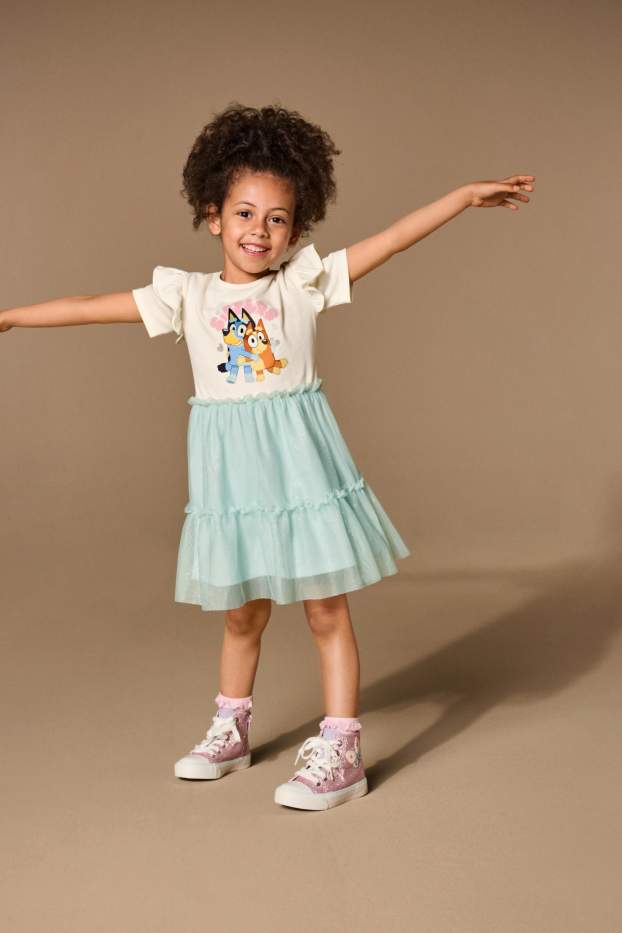 Kinderen: meisjes - Bluey - jurk - glanseffect - crème wit