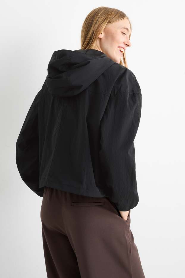Damen - Jacke mit Kapuze - wasserabweisend - schwarz