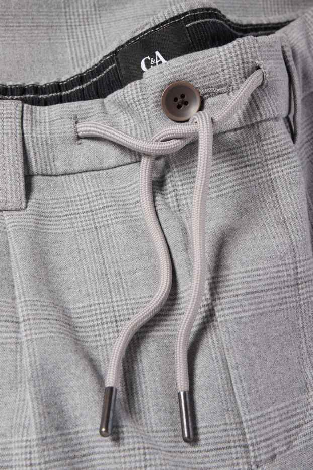 Mężczyźni - Chinosy - tapered fit - w kratkę - jasnoszary