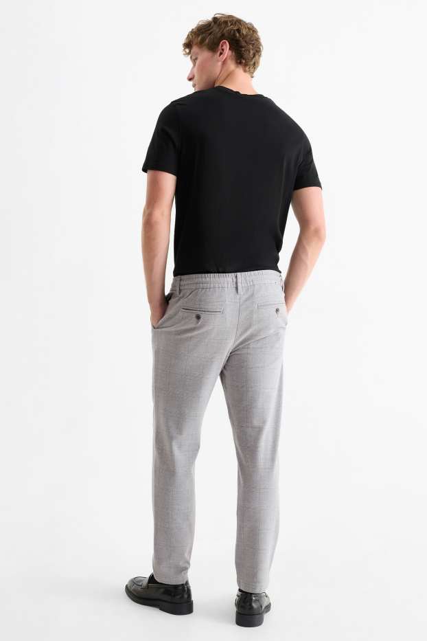 Mężczyźni - Chinosy - tapered fit - w kratkę - jasnoszary