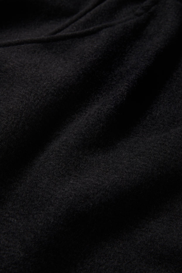 Dames - Poncho met franjes - zwart