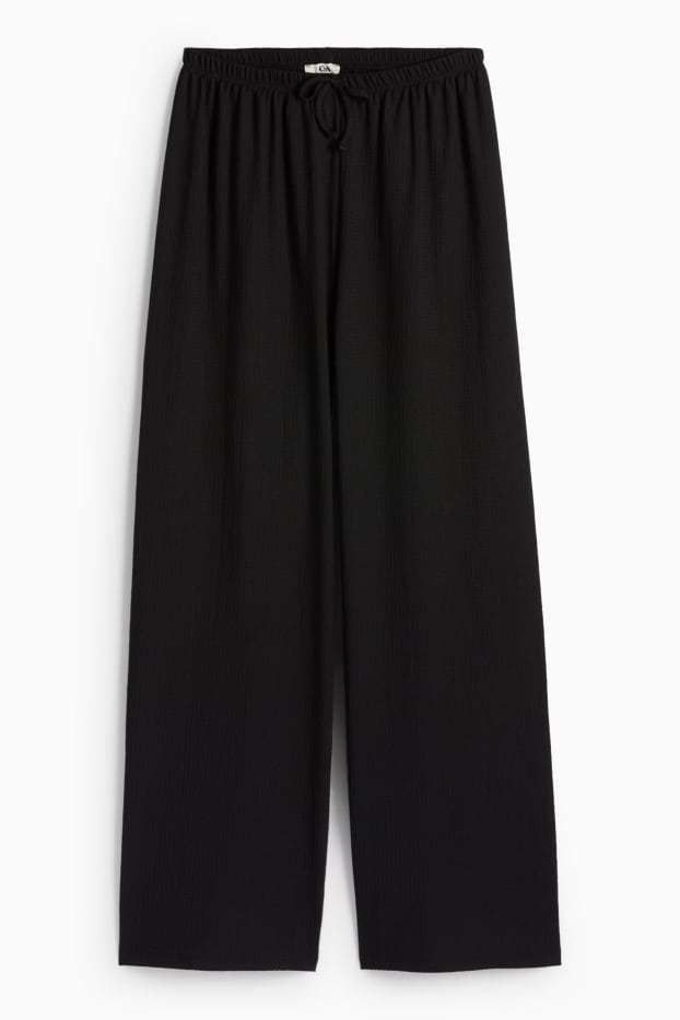 Dames - Broek van jersey - mid waist - wide leg - met structuur - zwart