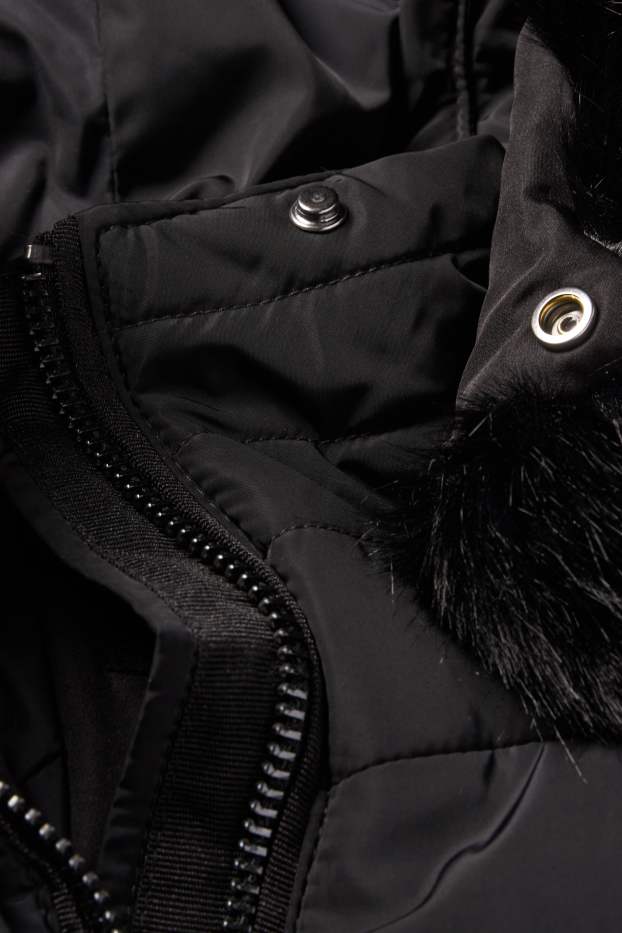 Women - Quilted coat with belt, hood and faux fur trim - black