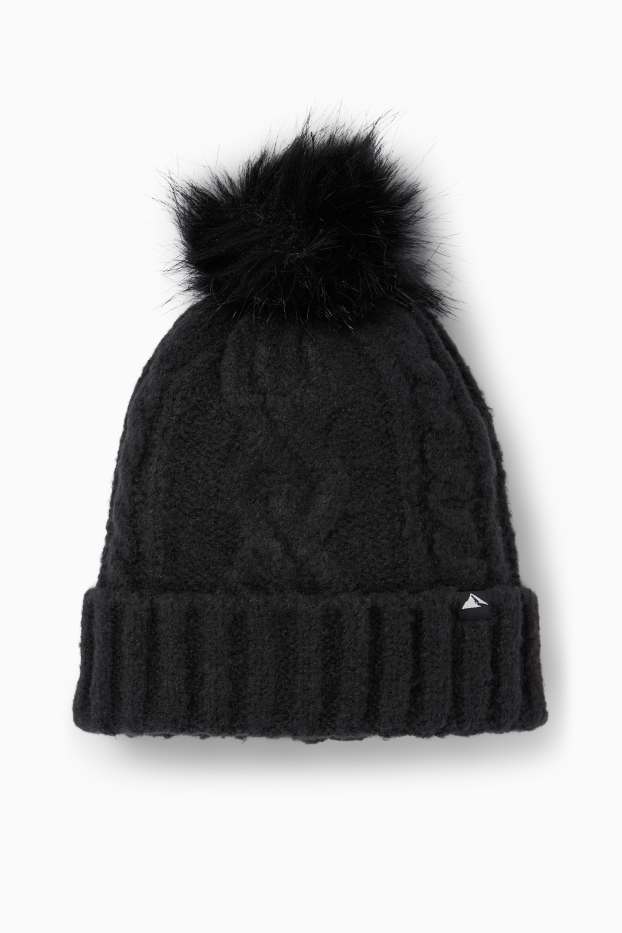 Kinderen: meisjes - Skimuts met pompon - kabelpatroon - zwart