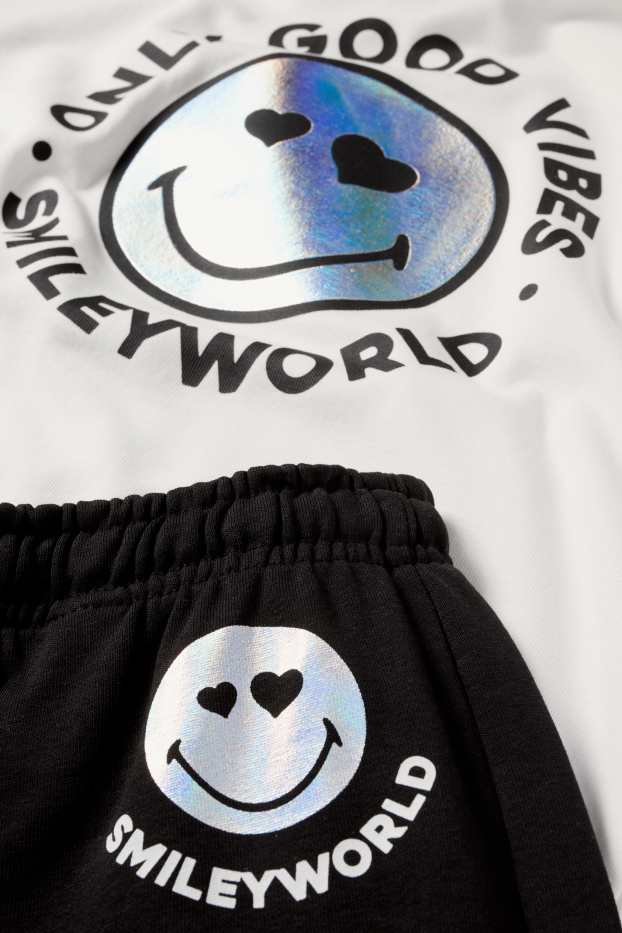 Dzieci dziewczynki - SmileyWorld® - komplet - bluza z kapturem i spodnie dresowe - 2 części - czarny / biały