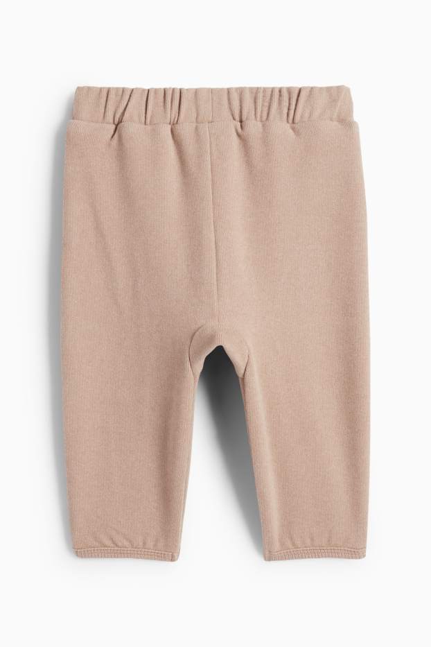 Unisex - Niemowlęce, ciepłe spodnie dresowe - beżowy